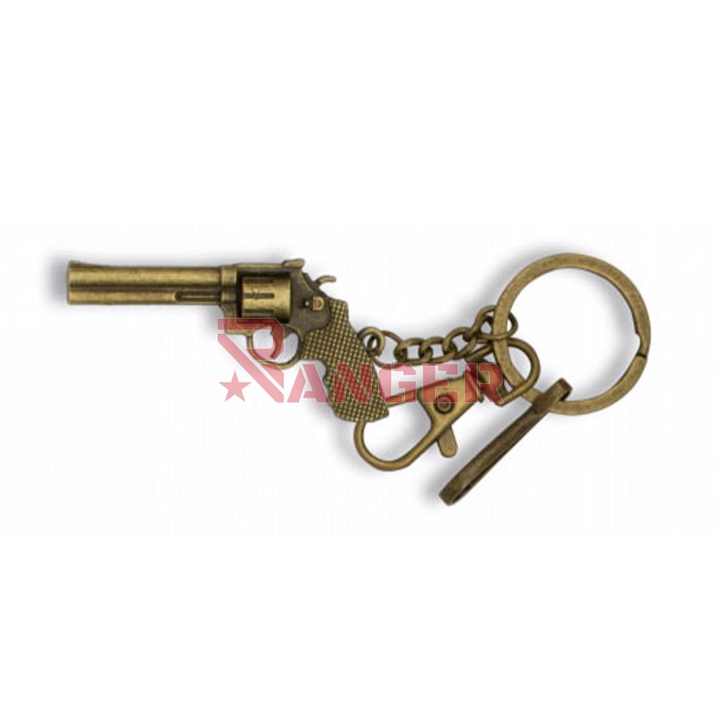 LLAVERO REVOLVER LARGO ZAMAK DORADO